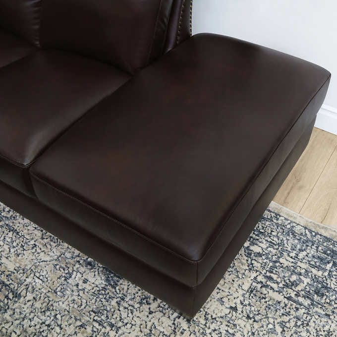 Encore leather outlet sectional and ottoman